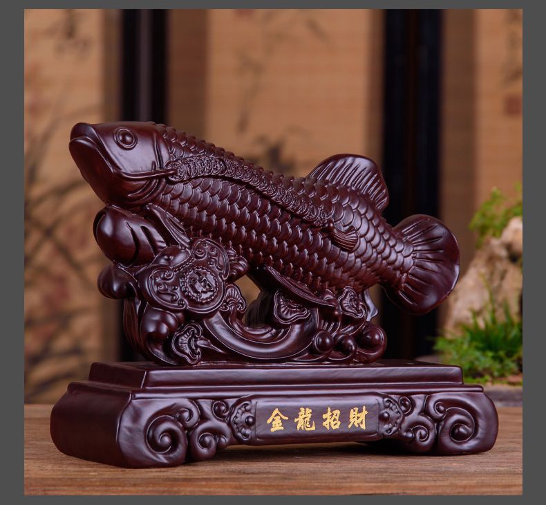 木雕金龍魚擺件應該怎么擺放，木雕金龍魚擺件招財效果研究金龍魚擺件與家居布局協調