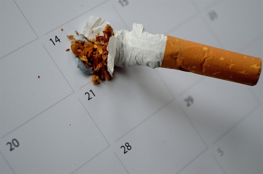 泰國虎魚的學名叫什么，我們家養了泰國虎魚全身紋路不清晰還偏黑色是不是假的啊