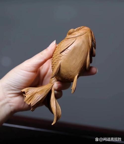 木雕金魚圖片大全大圖：“木雕金魚”傳統(tǒng)手工藝品的藝術(shù)魅力與視覺(jué)呈現(xiàn)