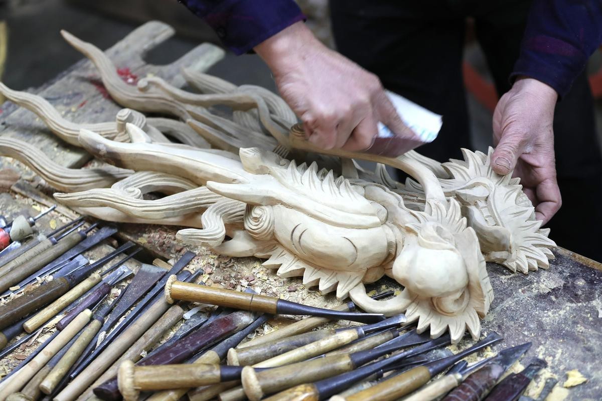 有沒有高清的木雕龍頭圖片？|福建晉江潘山廟宇木雕非遺之美新華社木雕龍頭圖片