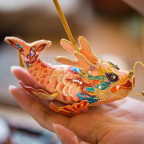 龍魚象征著什么吉祥物圖片【千秋文化,龍魚擺件擺放秘籍,招財運勢擋不住!】