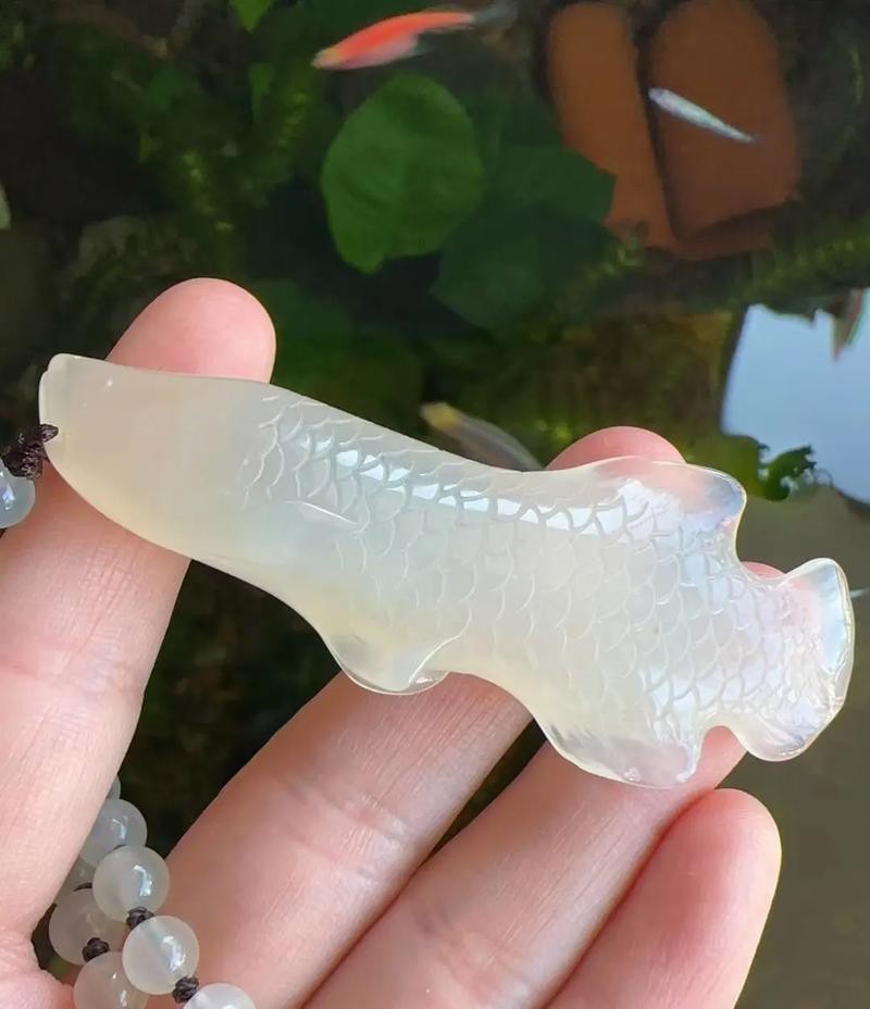 給我一些龍魚雕刻的圖片欣賞