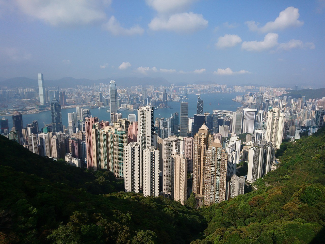 定居新加坡好還是香港