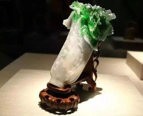 麒麟和魚缸擺一起見財化水：麒麟與魚缸擺在一起會產生“見財化水”的效果