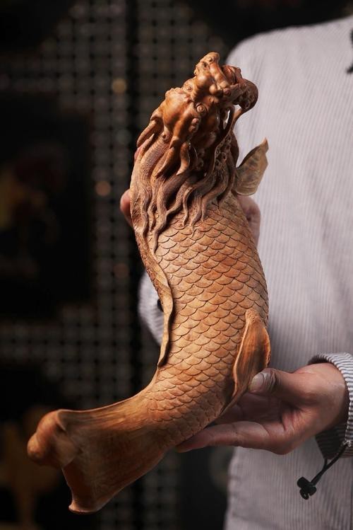 如何判斷龍魚木雕的材質？
