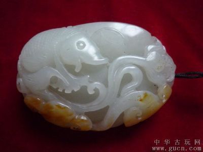 玉石金龍魚擺件：在玉器上雕刻龍和魚具有豐富的寓意和歷史文化背景 玉石金龍魚擺件：在玉器上雕刻龍和魚具有豐富的寓意和歷史文化背景 龍魚百科