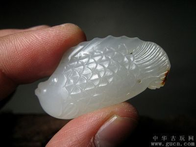 白玉金龍魚風水作用是什么：白玉金龍魚作為一種風水吉祥物
