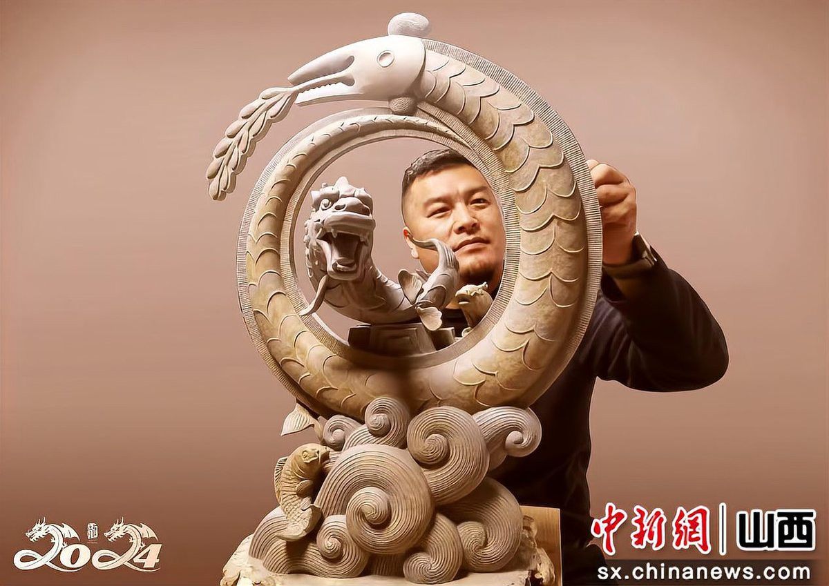 《鯉魚躍龍門》的創作背景是什么？
