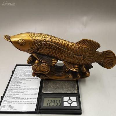 家有金龍魚的擺放方法（金龍魚擺件的擺放原則總結金龍魚擺件的擺放方法）