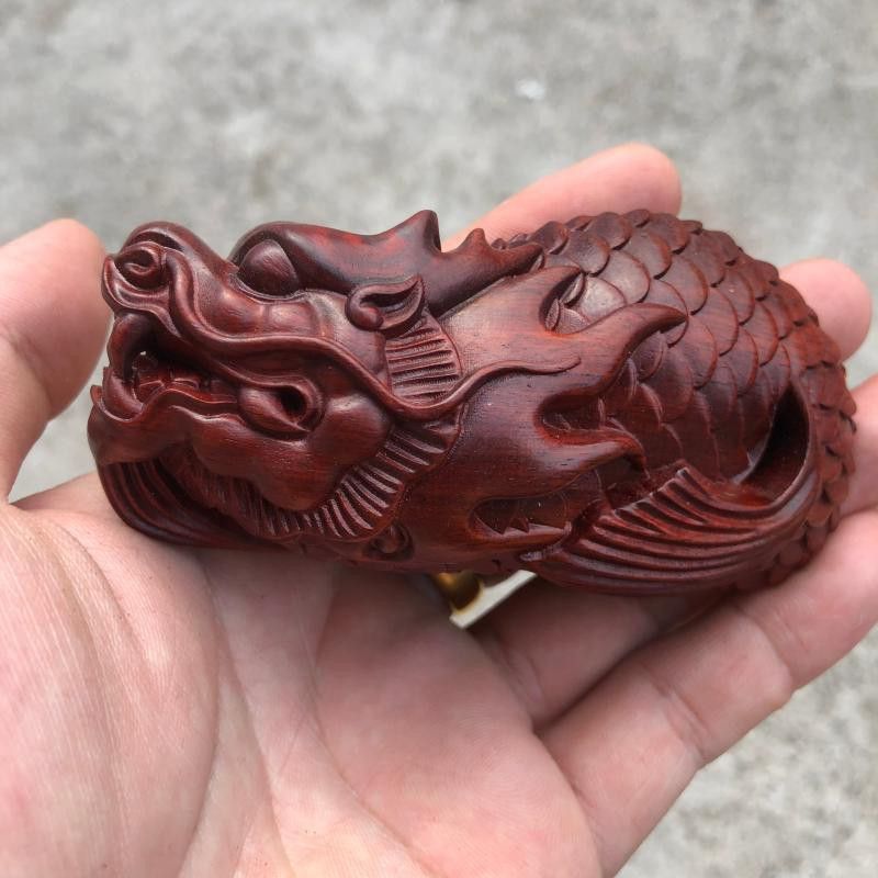 如何鑒別龍魚木雕的真偽？