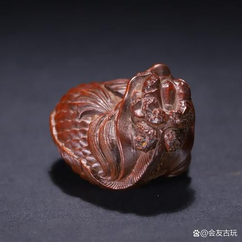 推薦一些現代龍魚木雕作品