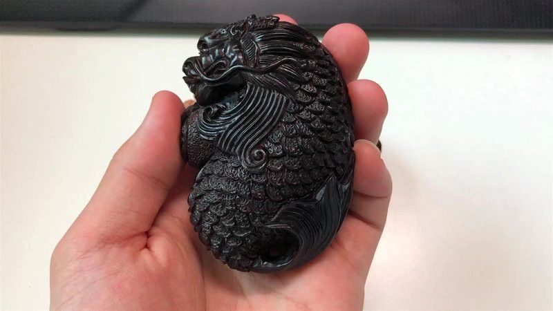 推薦一些現代龍魚木雕作品