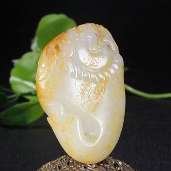 魚化龍玉墜寓意：魚化龍玉雕作為一種富有文化底蘊和吉祥寓意的玉器 魚化龍玉墜寓意：魚化龍玉雕作為一種富有文化底蘊和吉祥寓意的玉器 龍魚百科