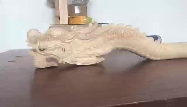 如何欣賞和評(píng)價(jià)現(xiàn)代木雕龍頭作品？