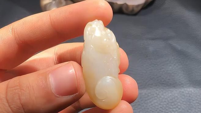 和田玉龍魚吊墜的價(jià)格是多少？