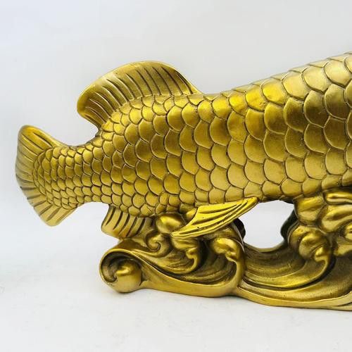 如何判斷雕刻金龍魚(yú)的材質(zhì)？