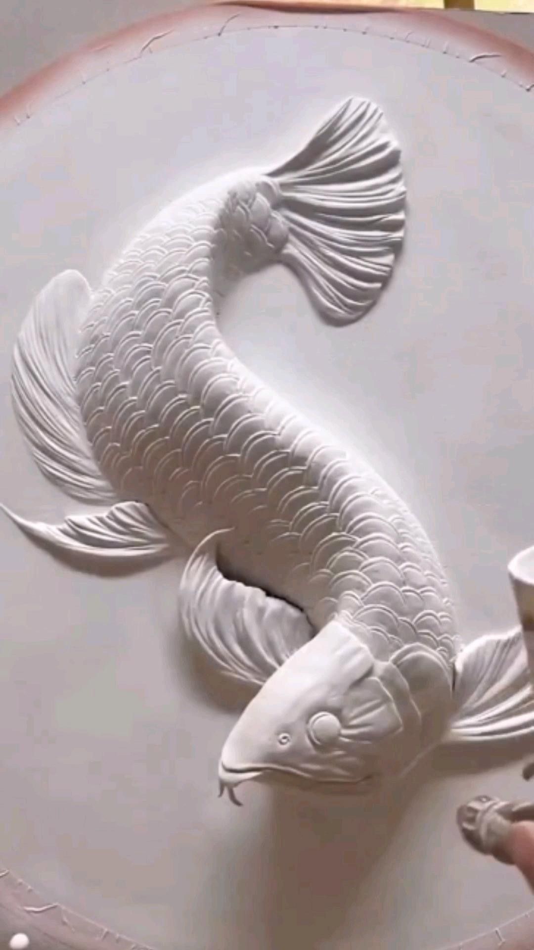 金龍魚浮雕有哪些知名品牌？