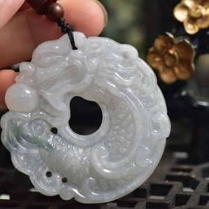 龍魚玉佩的寓意是什么：龍魚玉佩寓意是什么 龍魚玉佩的寓意是什么：龍魚玉佩寓意是什么 龍魚百科