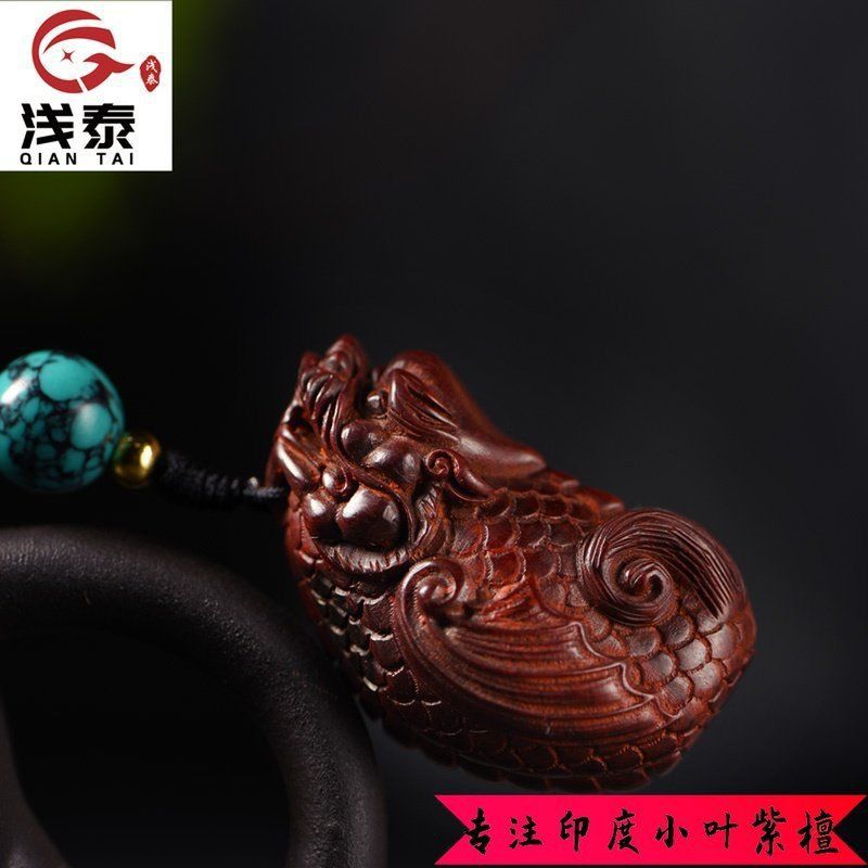 龍魚手把件的寓意和象征