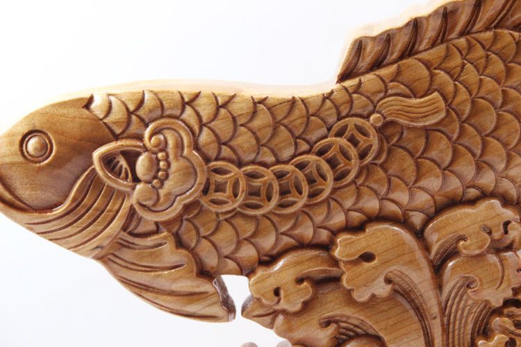 龍魚木雕壞了扔了怎么辦：對(duì)于損壞的龍魚木雕，有以下幾種處理方式，可以修復(fù)