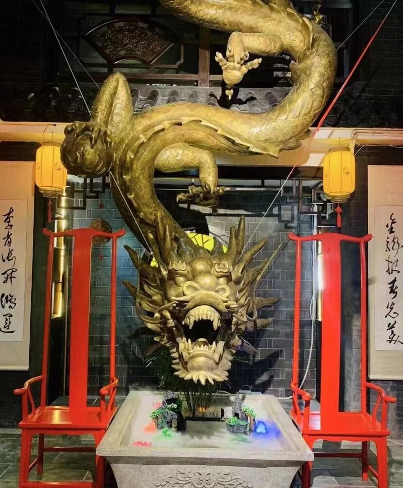 再給我?guī)讉€水龍雕塑的實例