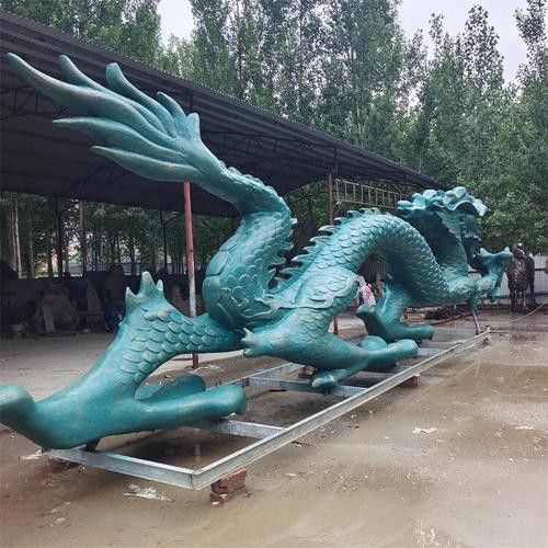 再給我?guī)讉€水龍雕塑的實例