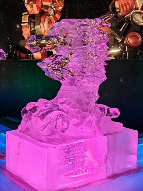 再給我?guī)讉€水龍雕塑的實例