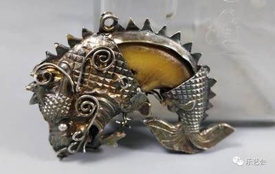 龍魚化龍：龍魚化龍是中國傳統寓意紋樣屬于一種龍頭魚身的龍頭魚身
