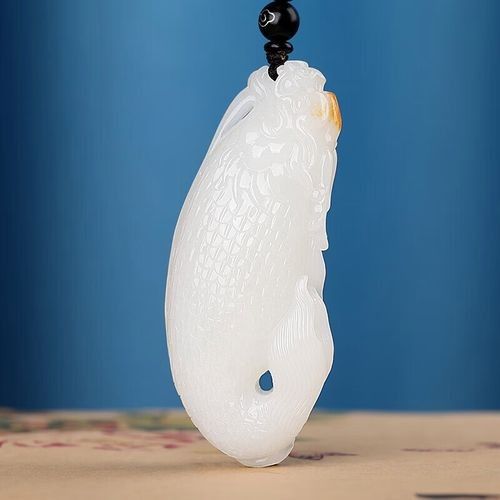 如何鑒別真假玉器龍魚：鑒別玉器龍魚的真假需要綜合觀察工藝特征、材質表現和歷史痕跡等多方面因素 如何鑒別真假玉器龍魚：鑒別玉器龍魚的真假需要綜合觀察工藝特征、材質表現和歷史痕跡等多方面因素 龍魚百科 第3張