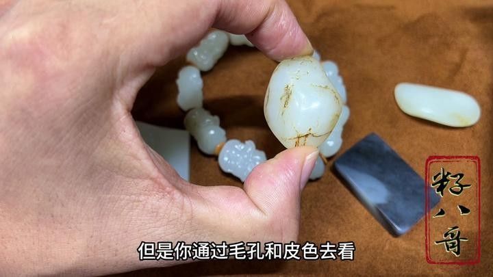 如何辨別真假和田玉籽料龍龜：和田玉籽料珠子鑒別全攻略和田玉籽料珠子鑒別全攻略 如何辨別真假和田玉籽料龍龜：和田玉籽料珠子鑒別全攻略和田玉籽料珠子鑒別全攻略 龍魚百科 第11張