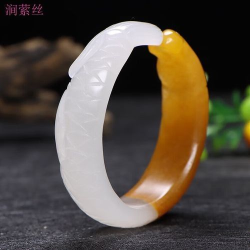 和田玉龍魚手鐲有哪些知名品牌：什么牌子的和田玉龍魚手鐲好 和田玉龍魚手鐲有哪些知名品牌：什么牌子的和田玉龍魚手鐲好 龍魚百科 第2張