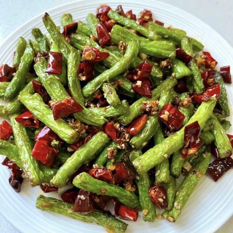 干煸菜肴炸后如何瀝油（干煸四季豆瀝油的正確做法，比飯店的還好吃大成子尋味）
