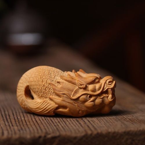 木雕龍魚的價格范圍是多少？（木雕龍魚價格可能在幾百到幾千元人民幣之間，具體取決于上述因素） 木雕龍魚的價格范圍是多少？（木雕龍魚價格可能在幾百到幾千元人民幣之間，具體取決于上述因素） 龍魚百科 第3張