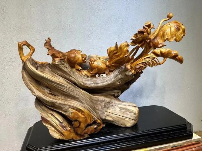 給我一些木雕金魚的圖片，木雕金魚的藝術(shù)魅力