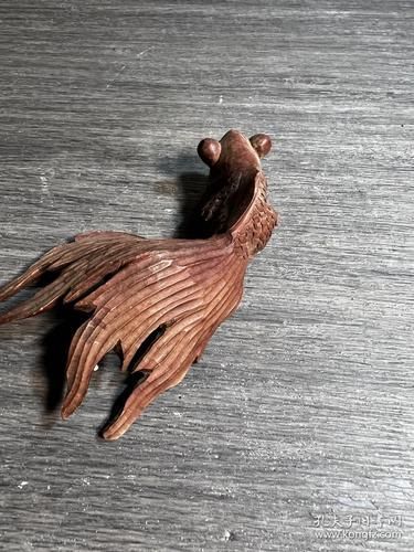 給我一些木雕金魚的圖片，木雕金魚的藝術(shù)魅力