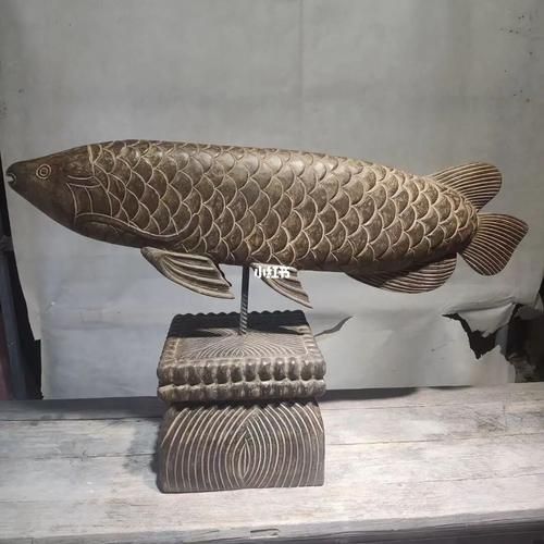 有沒有更多現(xiàn)代抽象風(fēng)格的石雕龍魚圖片，探索現(xiàn)代抽象風(fēng)格的石雕龍魚