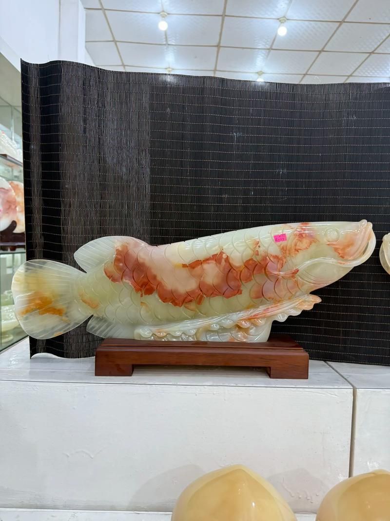 給我一些龍頭魚身擺件的圖片，龍頭魚身擺件怎么選