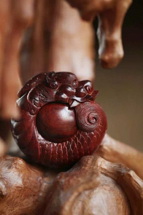 龍魚木雕有哪些名家作品，中國傳統木雕藝術之龍魚木雕 龍魚木雕有哪些名家作品，中國傳統木雕藝術之龍魚木雕 龍魚百科 第3張