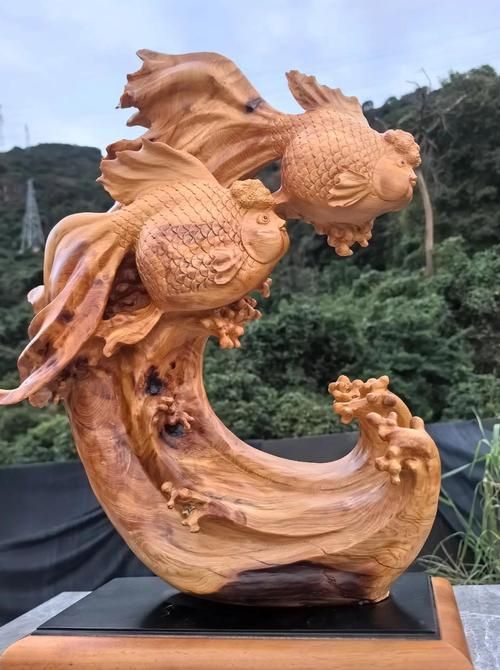 給我一些木雕金魚的圖片,中國五大木雕金魚選購指南,招財(cái)貓魚的最佳生長溫度是多少 龍魚百科 第8張 給我一些木雕金魚的圖片,中國五大木雕金魚選購指南,招財(cái)貓魚的最佳生長溫度是多少 給我一些木雕金魚的圖片,中國五大木雕金魚選購指南,招財(cái)貓魚的最佳生長溫度是多少 龍魚百科 第8張