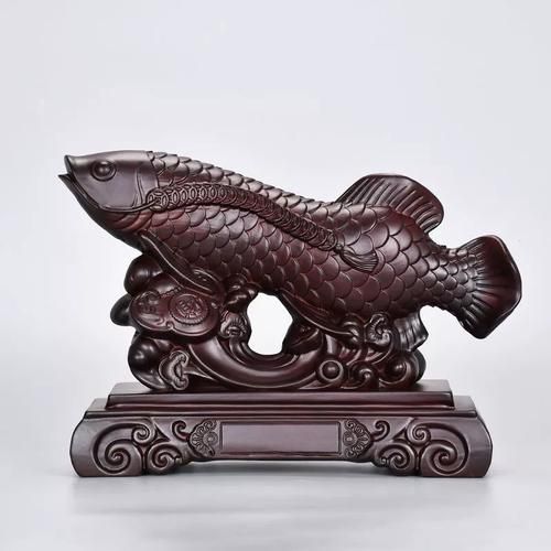 如何辨別真假雕刻金龍魚，如何辨別真假金龍魚