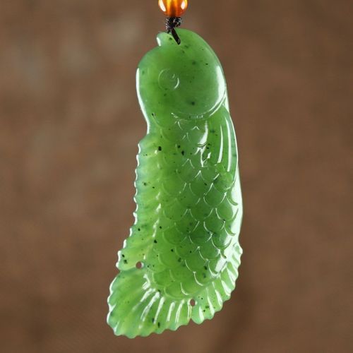 推薦幾款經典的龍魚玉雕作品，中國傳統玉器藝術中的龍魚玉雕作品推薦，兼具藝術價值與文化內涵 推薦幾款經典的龍魚玉雕作品，中國傳統玉器藝術中的龍魚玉雕作品推薦，兼具藝術價值與文化內涵 龍魚百科 第4張