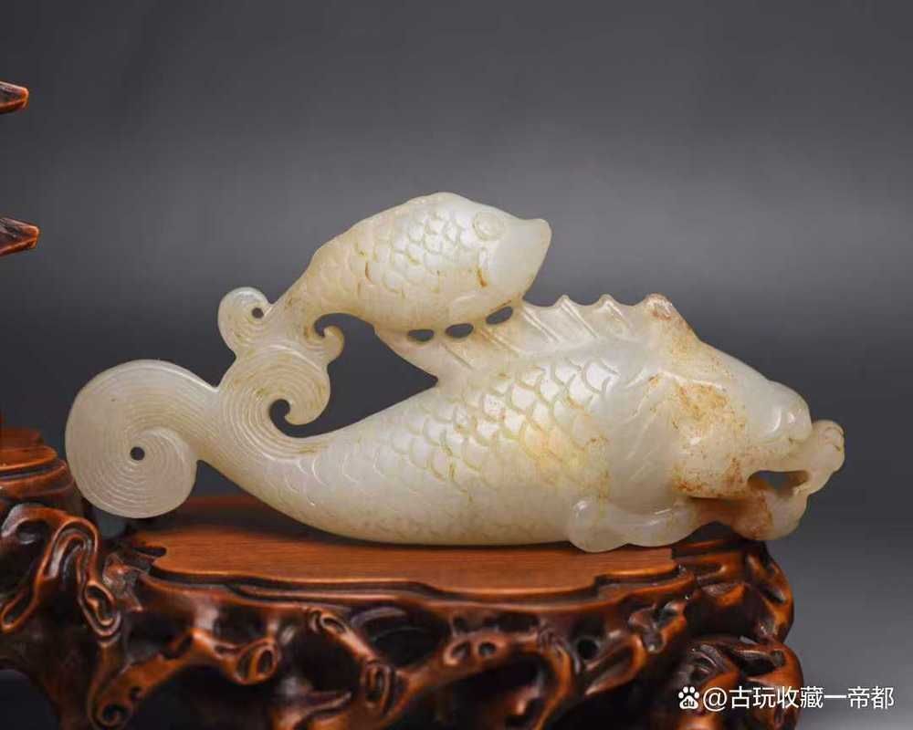 給我一些龍頭魚玉擺件的圖片，——龍頭魚玉擺件的真偽