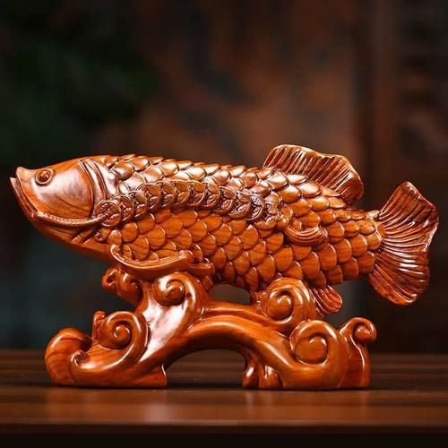 給我幾張金龍魚木雕的真品圖片，如何鑒別金龍魚木雕的真偽