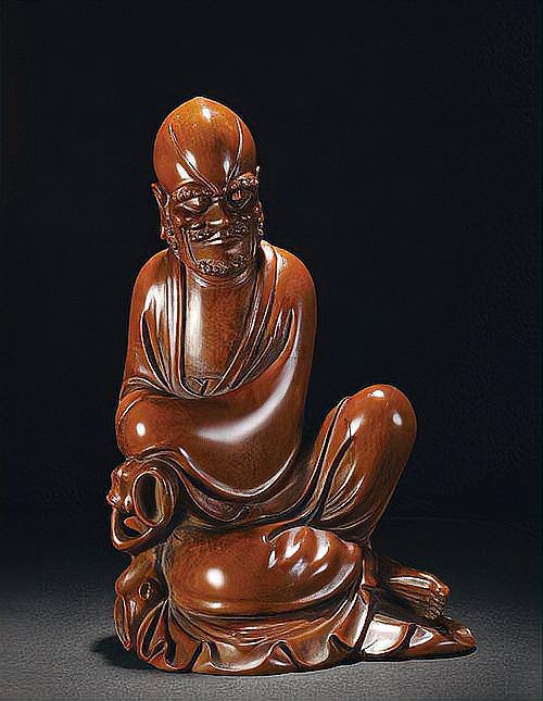 如何鑒別金龍魚木雕擺件的真?zhèn)危浚b別金龍魚木雕擺件的方法