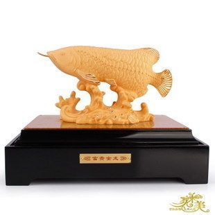 黃金金龍魚擺件：黃金金龍魚擺件是一種常見的風水擺件具有招財進寶的作用 黃金金龍魚擺件：黃金金龍魚擺件是一種常見的風水擺件具有招財進寶的作用 龍魚百科
