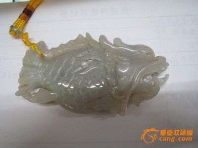 魚龍擺件的寓意：魚化龍玉石是一種富有深厚文化底蘊和精湛工藝的藝術品