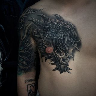 紋身龍頭魚身是什么寓意：紋身龍頭魚身的設(shè)計靈感來自于中國古代神話傳說中的神獸——螭吻 紋身龍頭魚身是什么寓意：紋身龍頭魚身的設(shè)計靈感來自于中國古代神話傳說中的神獸——螭吻 龍魚百科 第1張