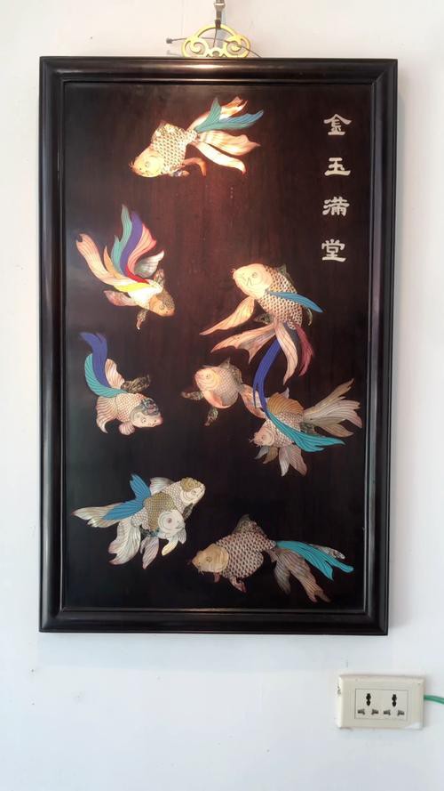 許廣彤的水墨金龍魚作品有哪些創新？