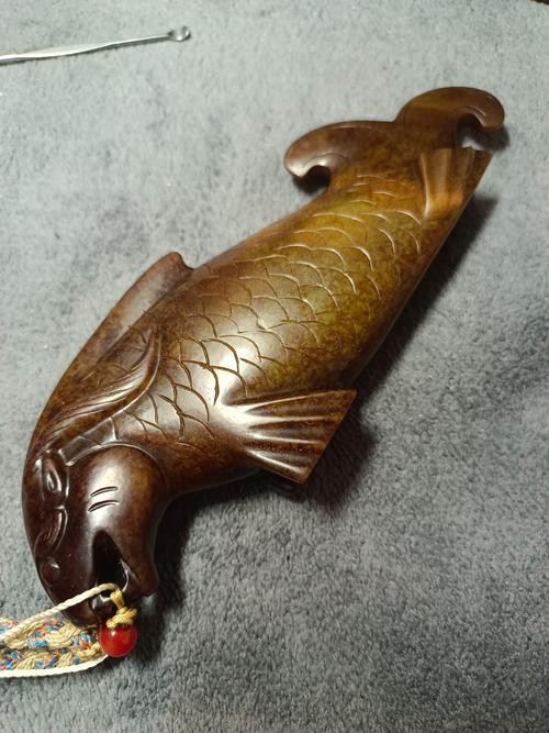 推薦一些專業的金龍魚雕刻大師作品