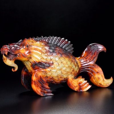 一、龍魚擺件不認主人（龍魚擺件是一種工藝品嗎）
